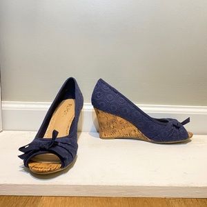 Navy blue lace cork wedges.